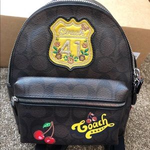 Brown Coach mini backpack